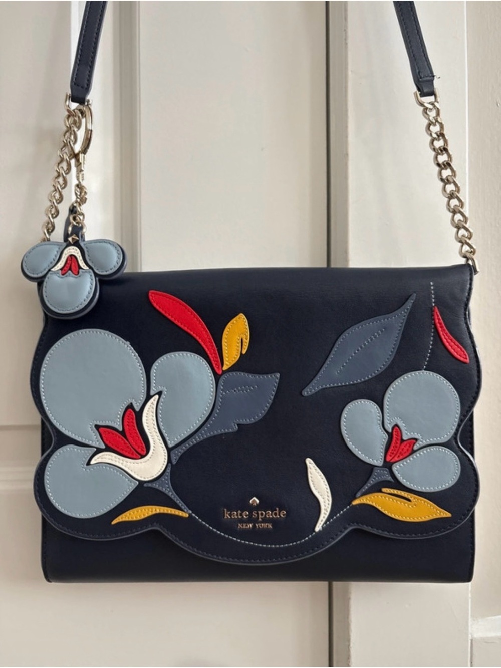 Kate Spade Briar Lane floral navy crossbody with bag charm